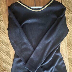 Dramatic deep vee backless black wool dress